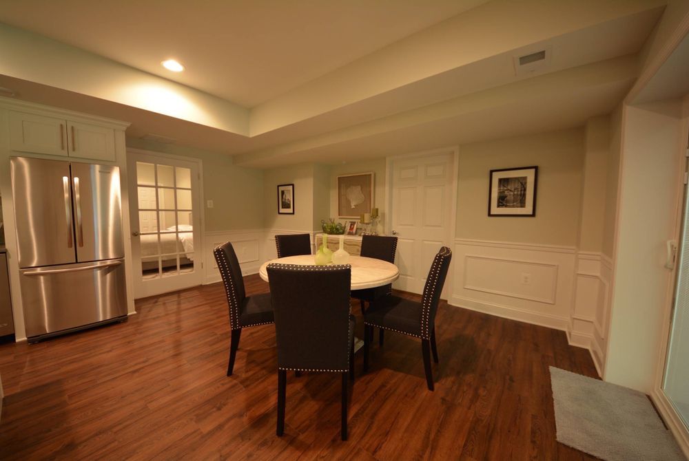 Image Wainscoting Wood wall paneling and wainscoting can transform your small basement into an elegant space