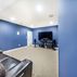 Basement Finishing  - Home Theatre in Blue, Beige Carpet