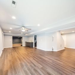 Basement Remodel -  Contemporary Light LVT, White Walls 