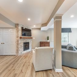 Basement remodel with a cozy family room and wet bar, Kensington, MD