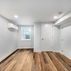 Finished Basement with a kitchen and exposed brick walls., Washington, DC