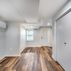 Finished Basement with a kitchen and exposed brick walls., Washington, DC