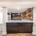 Finished Basement with a kitchen and exposed brick walls., Washington, DC