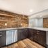 Finished Basement with a kitchen and exposed brick walls., Washington, DC