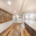 Finished Basement with a kitchen and exposed brick walls., Washington, DC