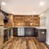 Finished Basement with a kitchen and exposed brick walls., Washington, DC