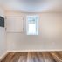 Welcoming basement finishing with beautiful built-ins and small wet-bar, Sykesville, MD 