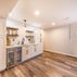 Welcoming basement finishing with beautiful built-ins and small wet-bar, Sykesville, MD 